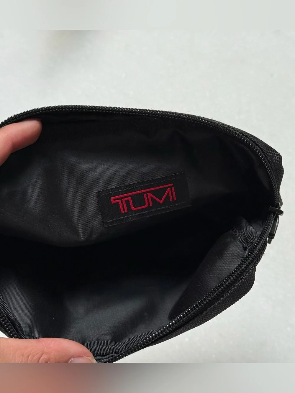 Tumi x Delta black zippered toiletry bag